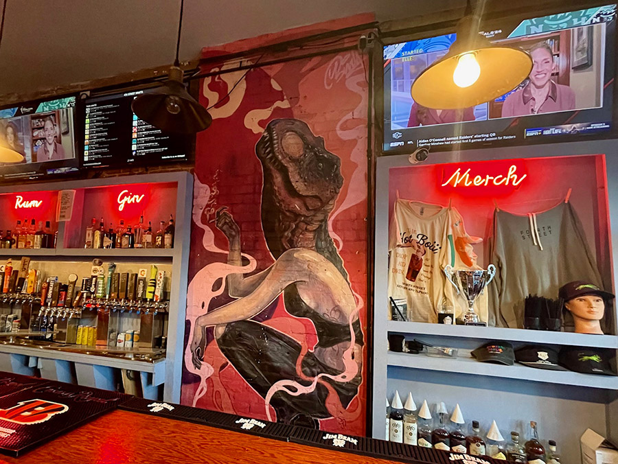 Dino-lady mural
